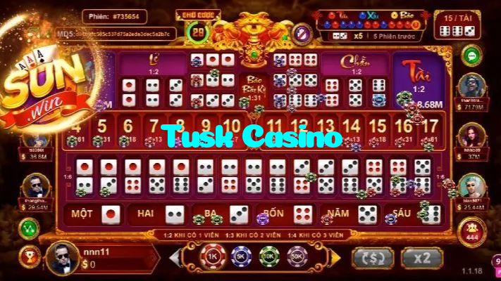 Tusk Casino casino presented on mobile device in Pakistan with slots and live games